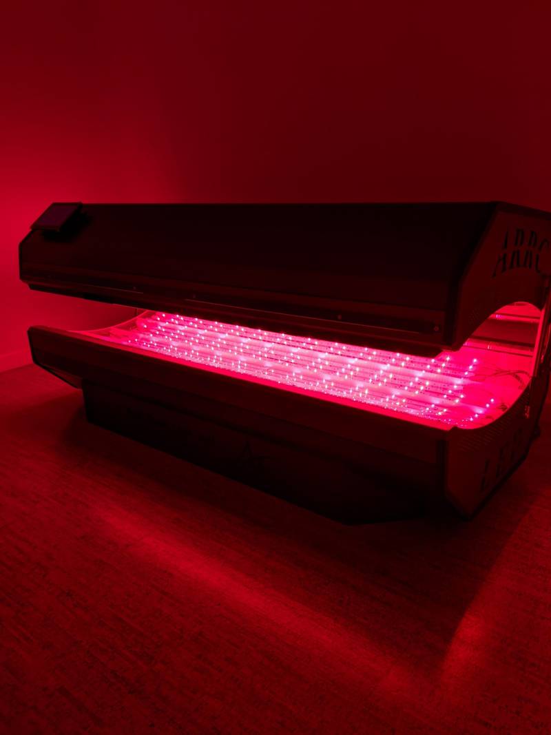 Top Rated Massage + Wellness Center in San Luis Obispo Red Light Therapy Bed at Sloco